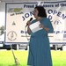 Lisa addresses to crowd at The Open